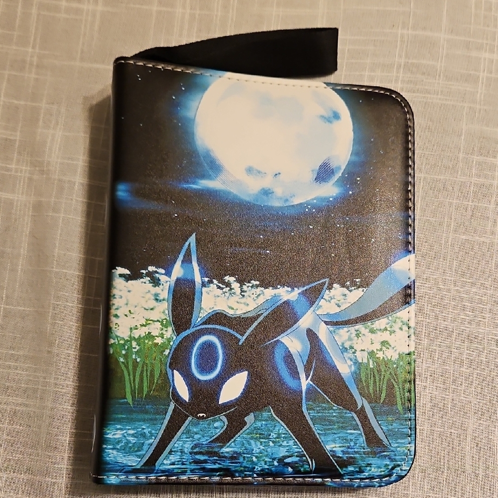 Pokemon Binder With 50 4 Pocket Sleeves, Zip Closure & Wrist Strap NEW